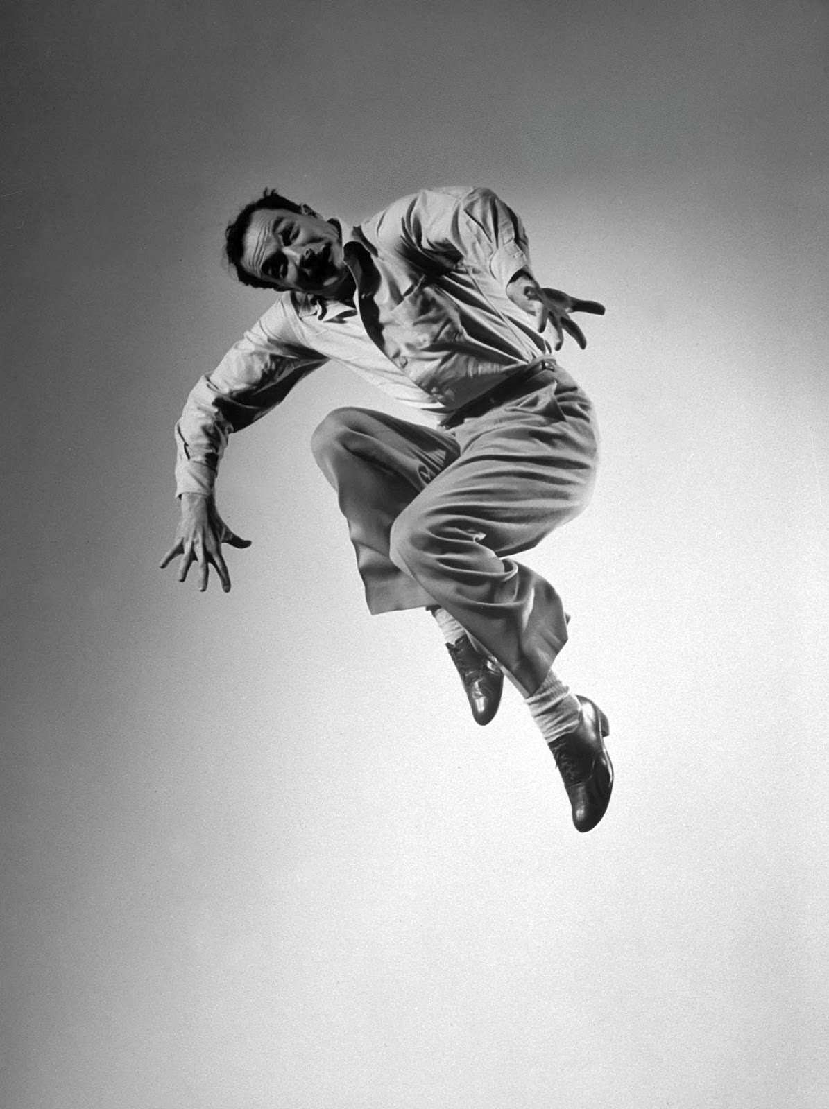 Gene Kelly with playful silly expressive arms