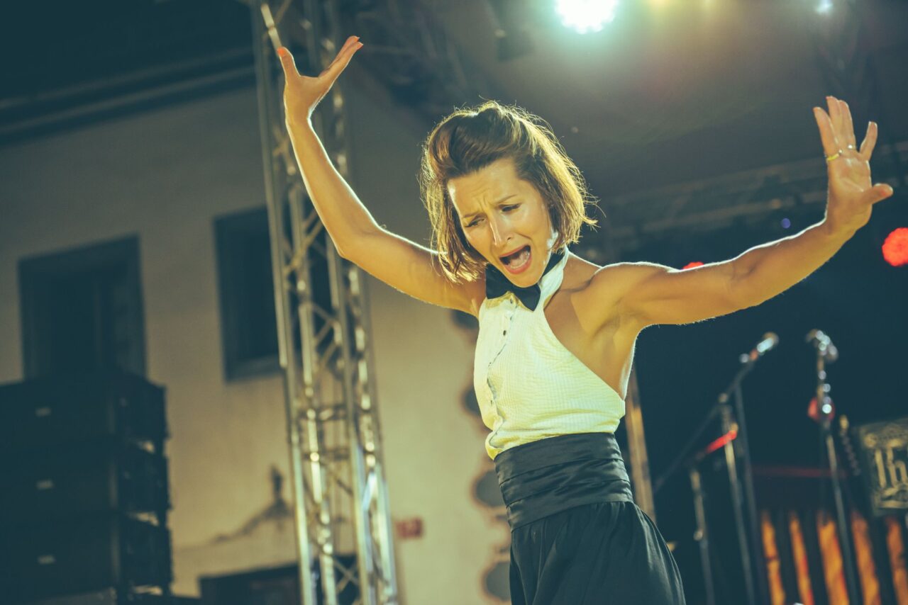 	1.	Ksenia demonstrating expressive arm movement in solo jazz dance
